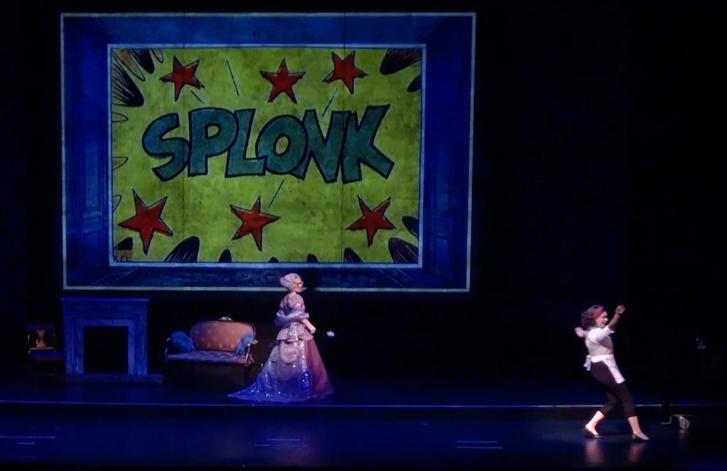 Backdrop of a SPLONK sound effect with Cendrillion and her fairy godmother.